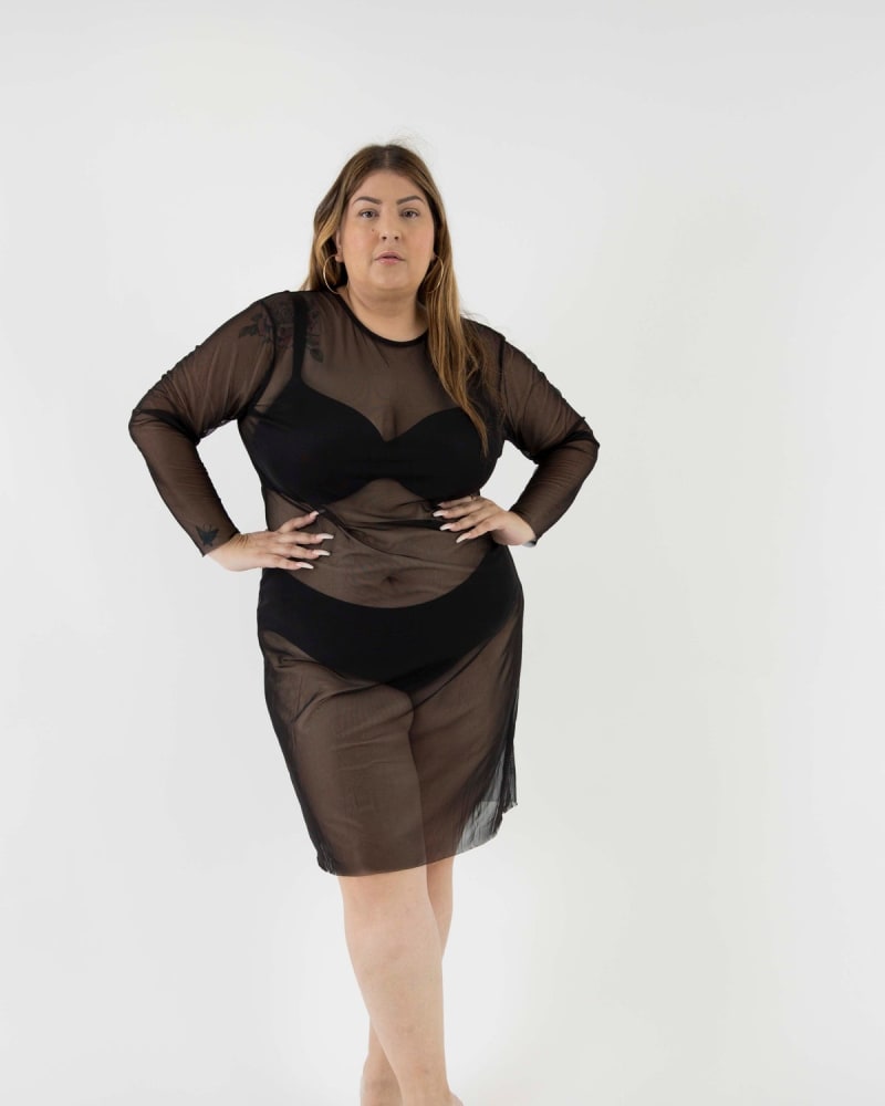 Front of a model wearing a size 3-4X The Ghost Mesh Xray Dress with a Jewel Neckline in Black by Sante Grace. | dia_product_style_image_id:237541